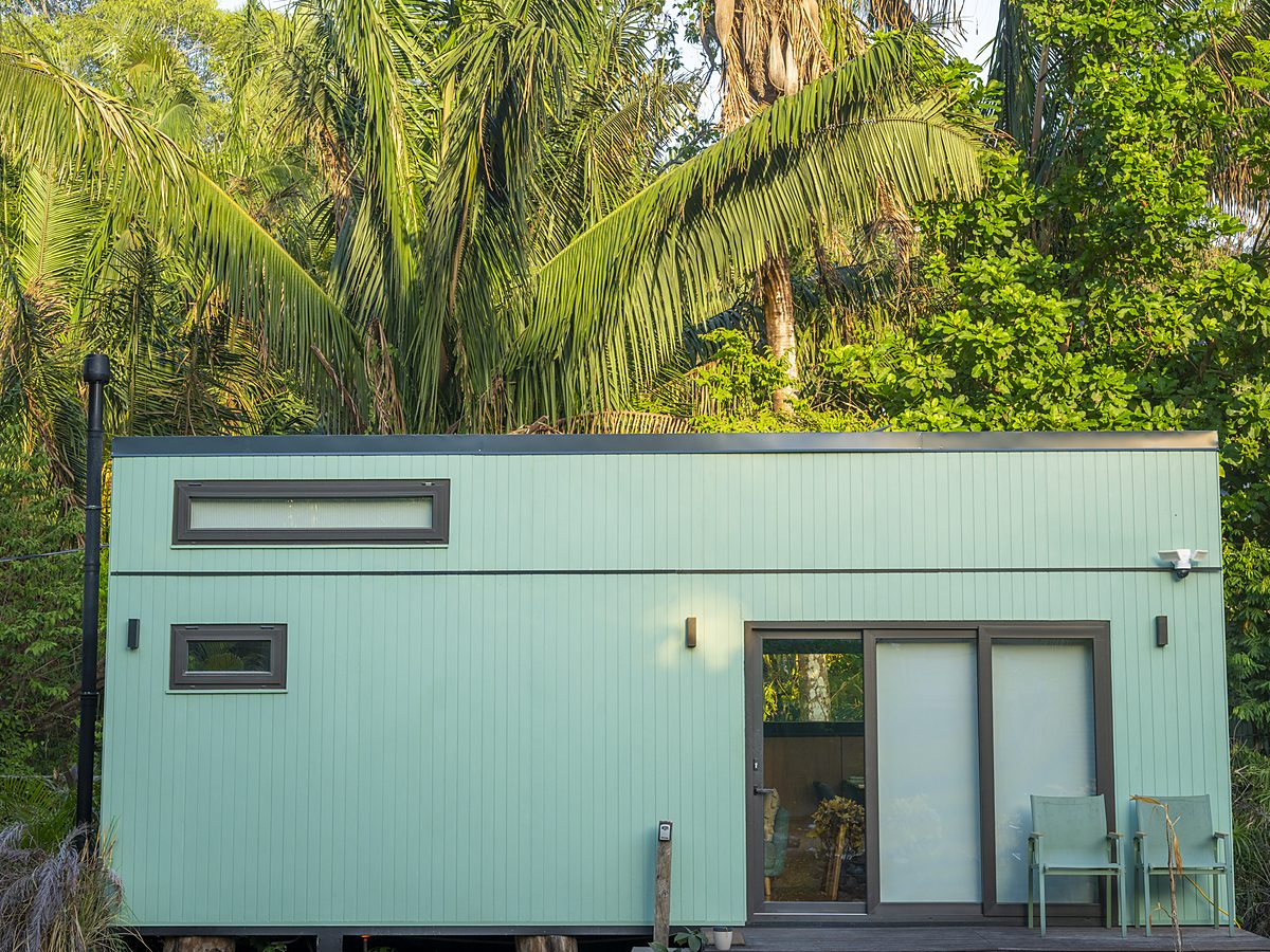 Athena — mint green eco tiny home nestled in the Nosara jungle