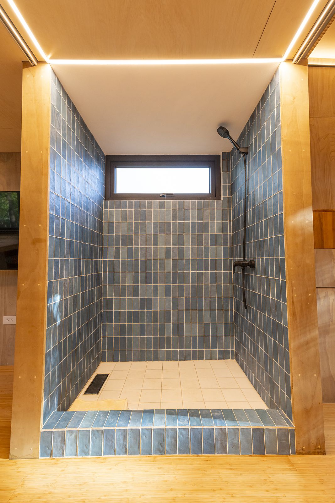 Aurora blue-tiled rain shower